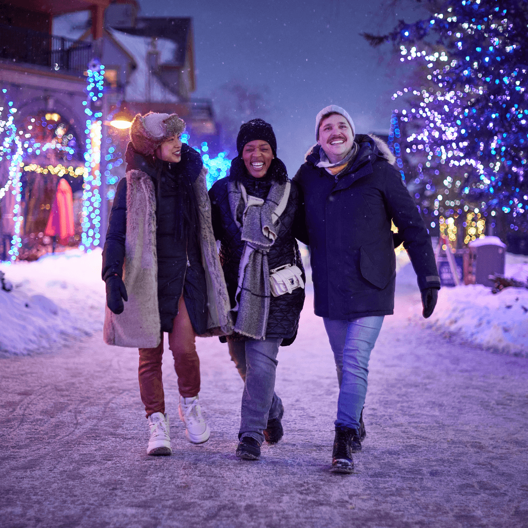 Friends walking around Blue at Night