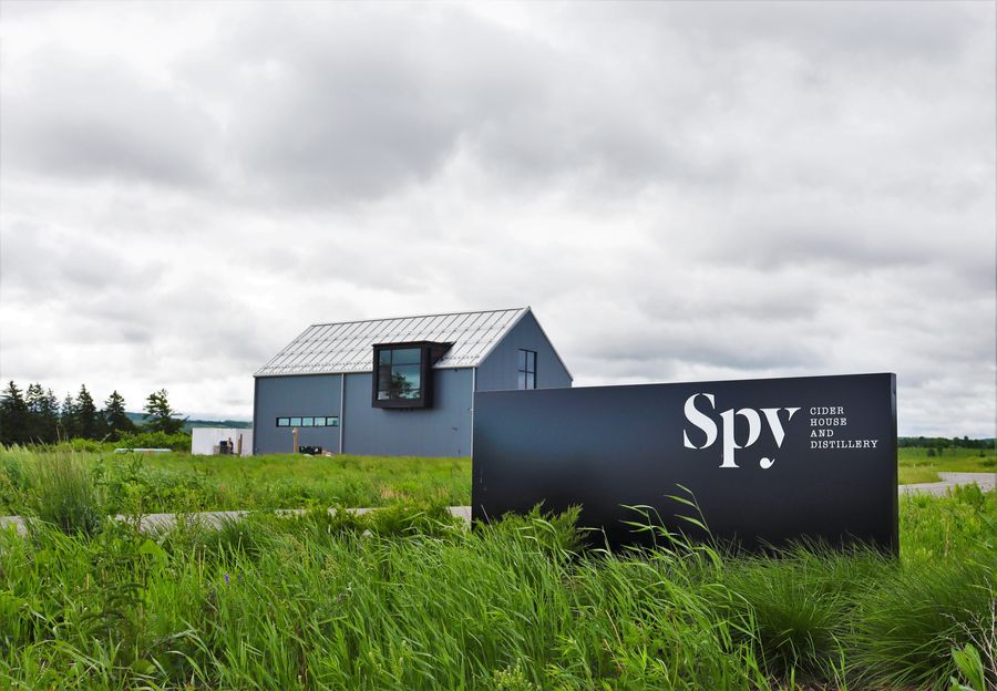 An image of Spy Cider House & Distillery from a distance.