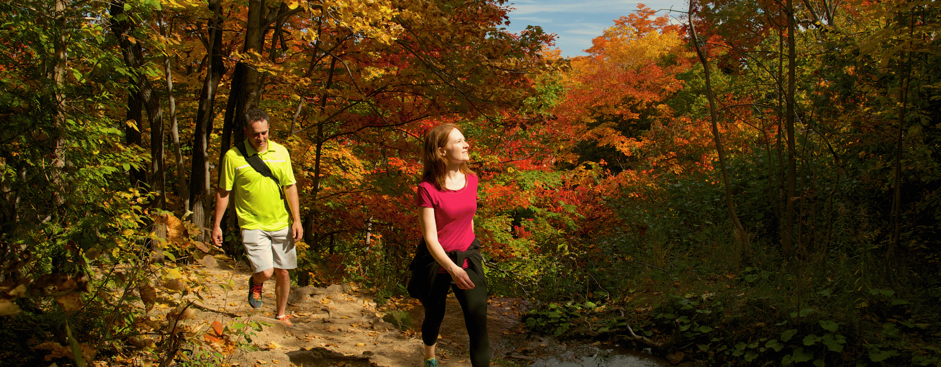 A couple hiking in the fall